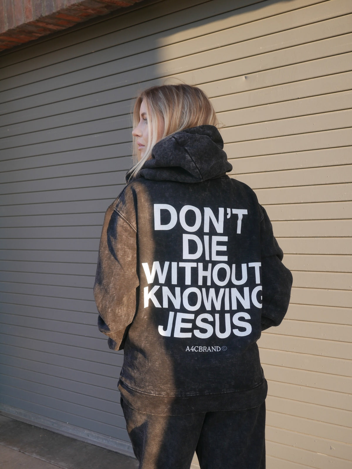 Don't Die Without Knowing Jesus washed black hoodie, back print on Juliana